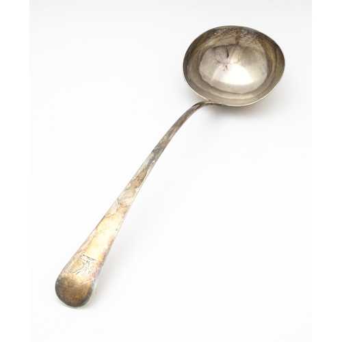 295 - A Geo III Old English pattern soup ladle. Hallmarked London 1803 maker Christopher & Thomas Wilkes B... 