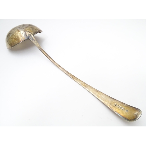 295 - A Geo III Old English pattern soup ladle. Hallmarked London 1803 maker Christopher & Thomas Wilkes B... 