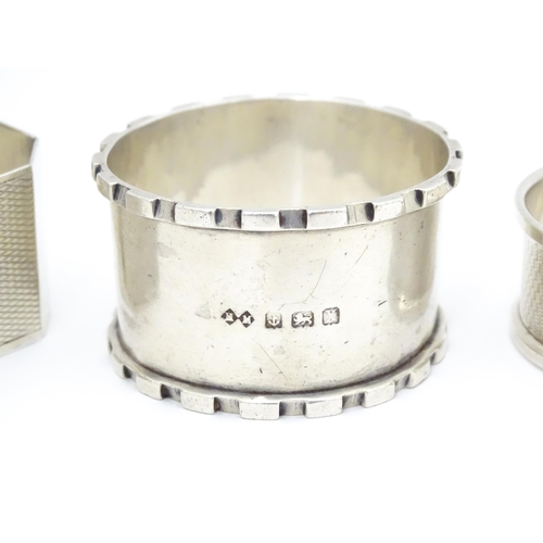 297 - Three various Art Deco silver napkin rings to include one hallmarked Birmingham 1922 maker henry Mat... 