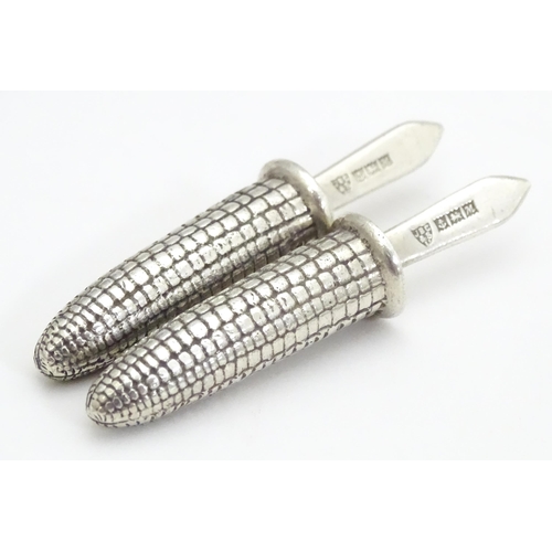 305 - A cased pair of silver novelty corn on the cob skewers / holders, hallmarked Birmingham 1961, maker ... 