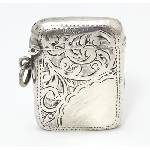 316 - A silver vesta case with engraved decoration, hallmarked Birmingham 1918, maker Joseph Gloster Ltd. ... 