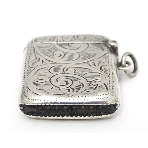 316 - A silver vesta case with engraved decoration, hallmarked Birmingham 1918, maker Joseph Gloster Ltd. ... 