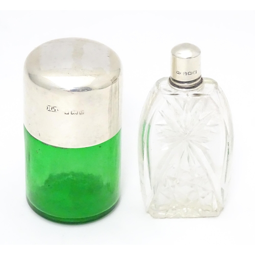 319 - A green glass salts bottle with silver lid hallmarked Birmingham 1904 maker Hillard & Thomason. Toge... 