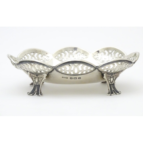 327 - A silver bon bon dish raised on four feet, hallmarked Birmingham 1913 maker J Boseck & Co. 4 3/4