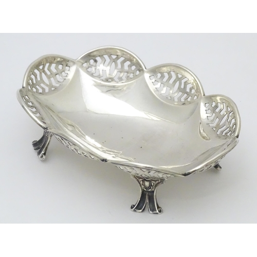 327 - A silver bon bon dish raised on four feet, hallmarked Birmingham 1913 maker J Boseck & Co. 4 3/4