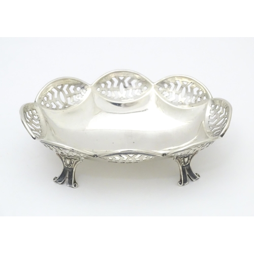 327 - A silver bon bon dish raised on four feet, hallmarked Birmingham 1913 maker J Boseck & Co. 4 3/4