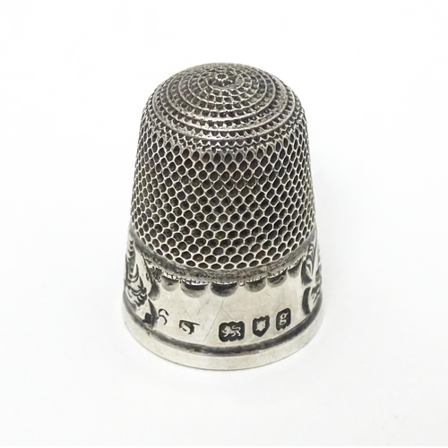 332 - A silver thimble hallmarked London 1902. maker S? . Approx 1