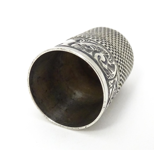 332 - A silver thimble hallmarked London 1902. maker S? . Approx 1