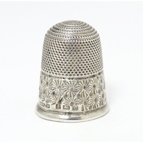 350 - A silver thimble hallmarked Birmingham 1902.