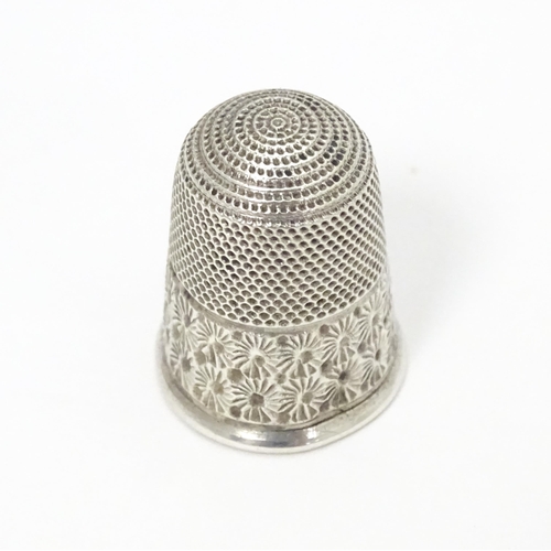 350 - A silver thimble hallmarked Birmingham 1902.