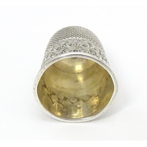 350 - A silver thimble hallmarked Birmingham 1902.