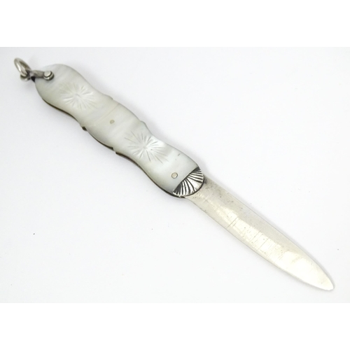 355 - A Victorian silver folding fruit knife with mother of pearl handle, hallmarked Sheffield 1867, maker... 