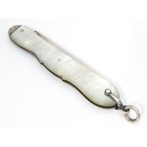 355 - A Victorian silver folding fruit knife with mother of pearl handle, hallmarked Sheffield 1867, maker... 