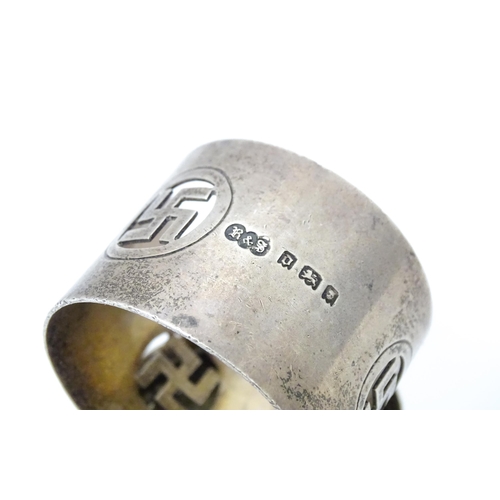 356 - Two napkin rings,  one with hammered decoration and hallmarked Birmingham 1907 maker W Turner, the o... 