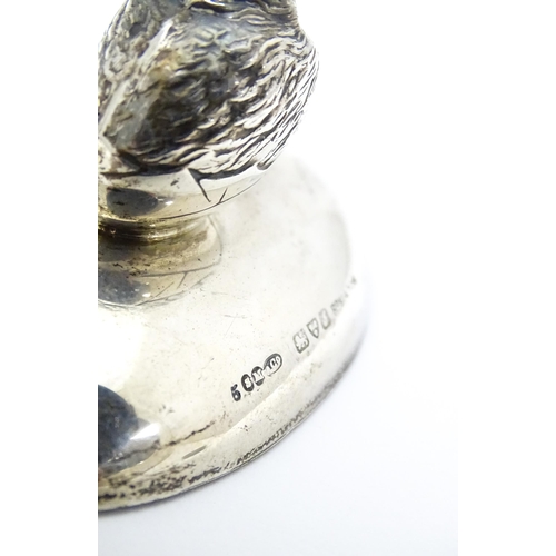 363 - A silver paperweight of ovoid form surmounted by model of a chick. Hallmarked Chester 1909 maker Sam... 