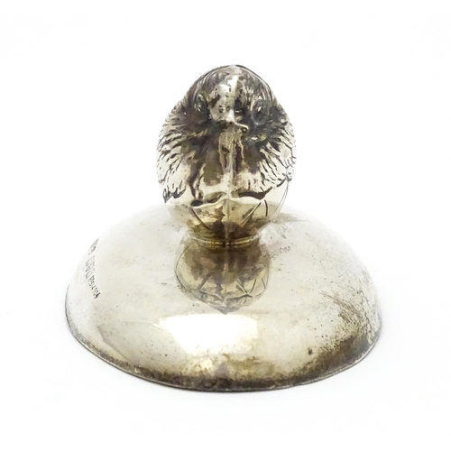 363 - A silver paperweight of ovoid form surmounted by model of a chick. Hallmarked Chester 1909 maker Sam... 