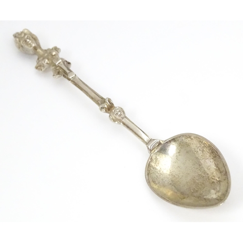 365 - A Victorian Scottish silver spoon, the handle surmounted by a figurehead. Hallmarked Edinburgh 1893 ... 