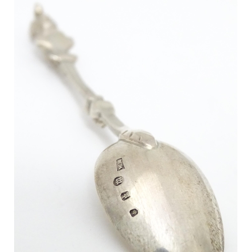 365 - A Victorian Scottish silver spoon, the handle surmounted by a figurehead. Hallmarked Edinburgh 1893 ... 