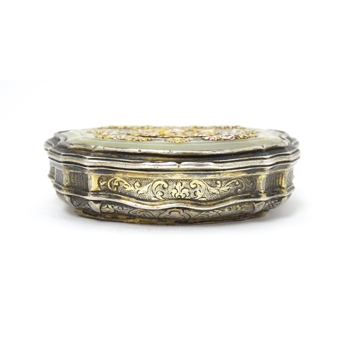 366 - A Continental silver gilt snuff box of shaped form with panels of mother of pearl, the lid decorated... 