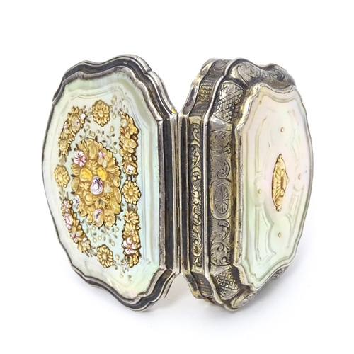 366 - A Continental silver gilt snuff box of shaped form with panels of mother of pearl, the lid decorated... 