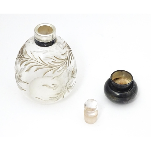 369 - A cut glass scent / perfume bottle with silver top, hallmarked London 1918 maker Charles May 4