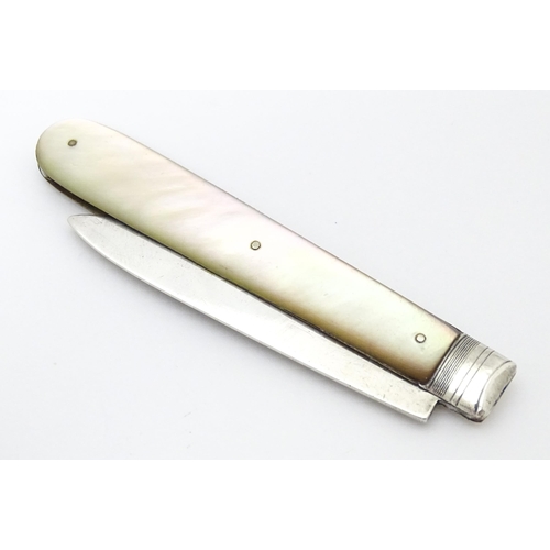 370 - A Victorian silver folding fruit knife with mother of pearl handle, hallmarked Sheffield 1870 maker ... 