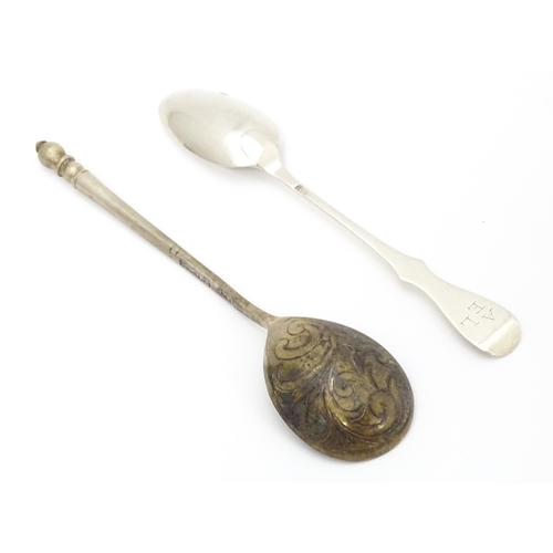 381 - A Russian silver spoon with engraved decoration to bowl. Approx 5