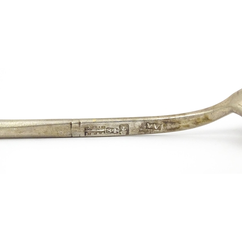 381 - A Russian silver spoon with engraved decoration to bowl. Approx 5