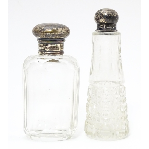 390 - A cut glass scent/ perfume bottle with silver top hallmarked Birmingham 1906 maker Levi & Salaman to... 