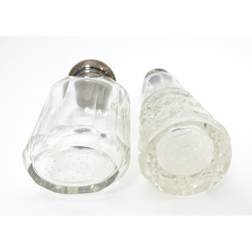 390 - A cut glass scent/ perfume bottle with silver top hallmarked Birmingham 1906 maker Levi & Salaman to... 