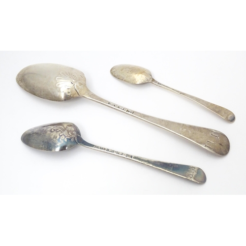 395 - Three 18thC silver tablespoons to include a fancy back shell tablespoon hallmarked London 1767, a fa... 