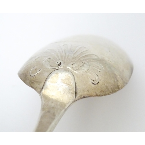 395 - Three 18thC silver tablespoons to include a fancy back shell tablespoon hallmarked London 1767, a fa... 