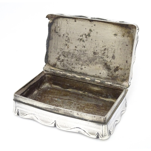 397 - A Victorian silver snuff box with engraved and engine turned decoration. Hallmarked Birmingham c.184... 