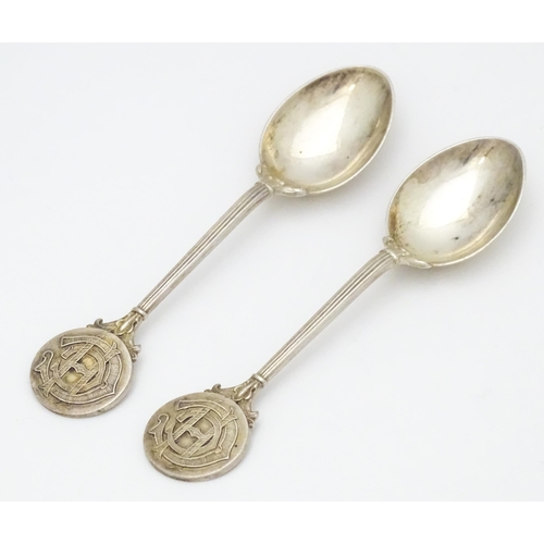 398 - Two silver teaspoons monogrammed to  handles HGC (? Golf Club) . Hallmarked Birmingham 1928/1930 mak... 