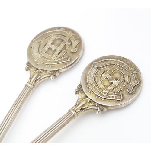 398 - Two silver teaspoons monogrammed to  handles HGC (? Golf Club) . Hallmarked Birmingham 1928/1930 mak... 