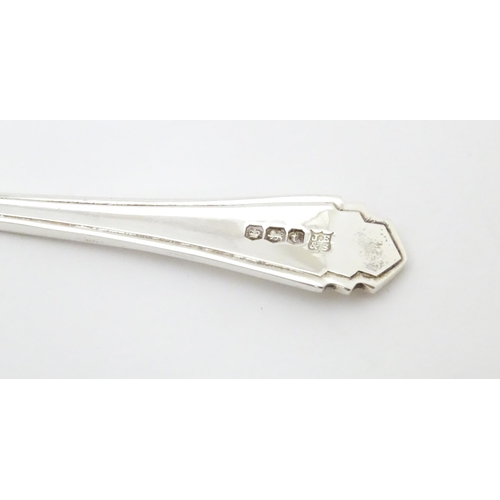 425 - An Art Deco child's silver spoon and pusher hallmarked Sheffield 1936, maker Joseph Elliot & Sons. C... 