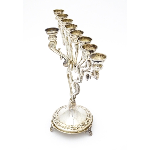 430 - Judaica : A sterling silver Hanukkah Menorah candelabra with 9 branches, marked sterling and .925. A... 