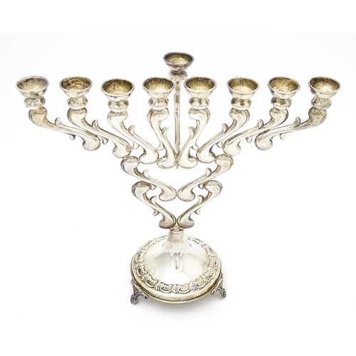 430 - Judaica : A sterling silver Hanukkah Menorah candelabra with 9 branches, marked sterling and .925. A... 