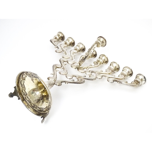 430 - Judaica : A sterling silver Hanukkah Menorah candelabra with 9 branches, marked sterling and .925. A... 