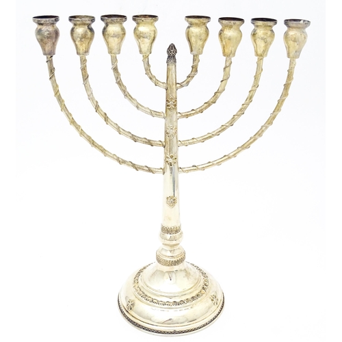 431 - Judaica : A .925 silver Hanukkah Menorah candelabra with 8 branches. Approx. 13