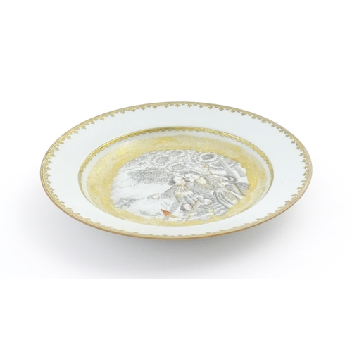 25 - A Chinese export plate decorated in grisaille with gilt highlights depicting Les Pelerins De L'Isle ... 