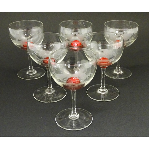 188 - Six 19thC wine glasses, each decorated with cockfighting scenes and cherry detail to the stem top. A... 