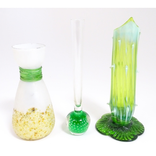 190 - Three items of art glass to include a bud vase and two other vases, one of uranium glass in the mann... 