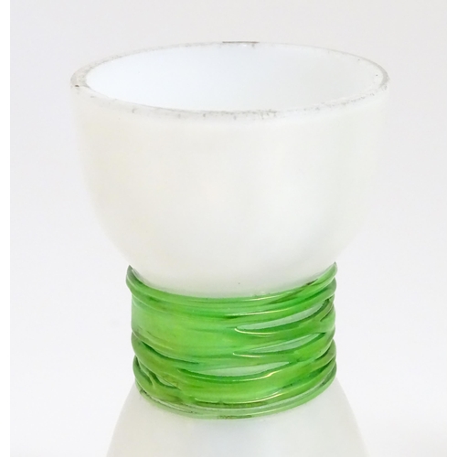 190 - Three items of art glass to include a bud vase and two other vases, one of uranium glass in the mann... 