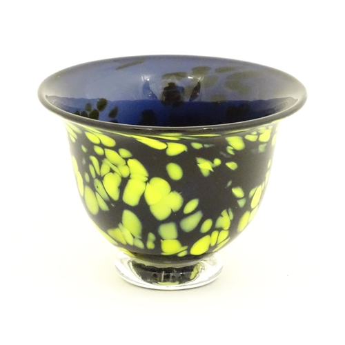 195 - A Welsh art glass bowl with mottled yellow detail. Signed under Laugharne. Approx 3 1/4