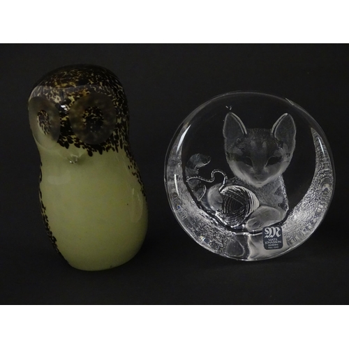 206 - Four 20thC glass paperweights, comprising a Wedgwood owl, two Mats Jonasson cats and a white/purple ... 