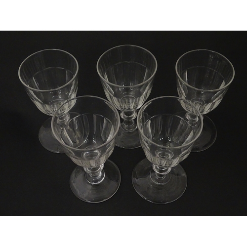 207 - Five cut glass champagne coupes together with five cut glass pedestal wine glasses. Approx 4 1/2