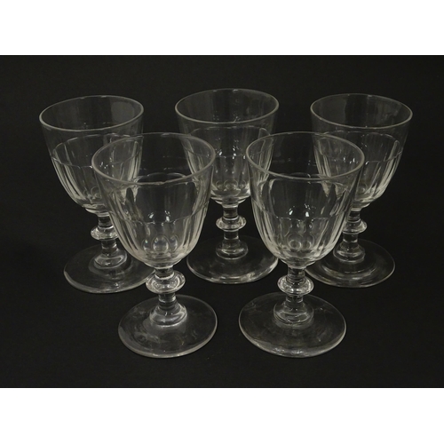 207 - Five cut glass champagne coupes together with five cut glass pedestal wine glasses. Approx 4 1/2