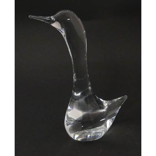 216 - A clear glass model of a goose, signed Daum France. Approx 7 1/2