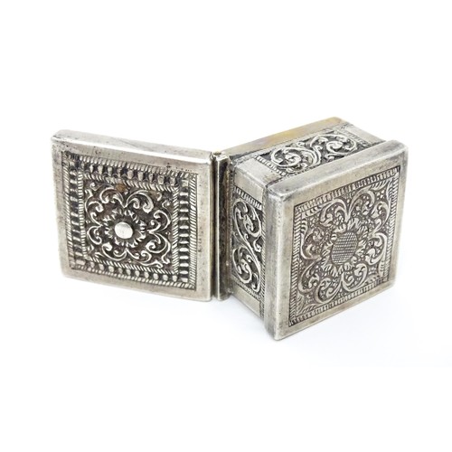 437 - A white metal stamp box with acanthus scroll detail. 1 1/4